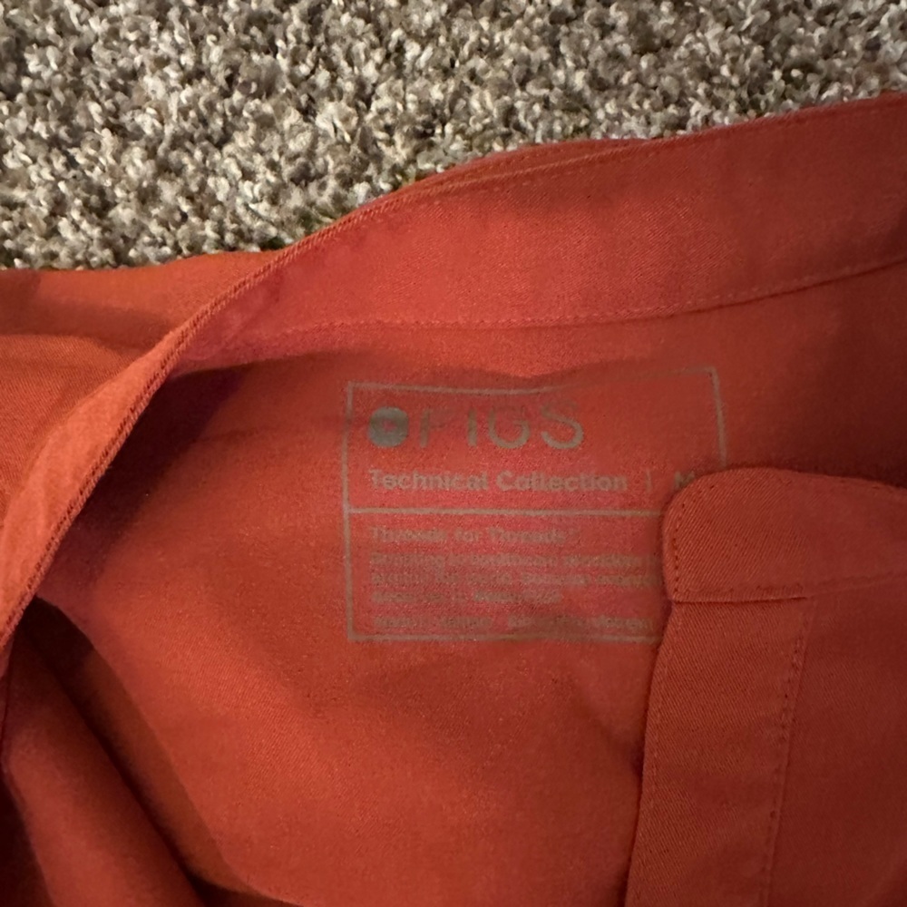 FIGS Women's Sleeveless Scrub Top in Burnt Orange - Picture 3 of 4